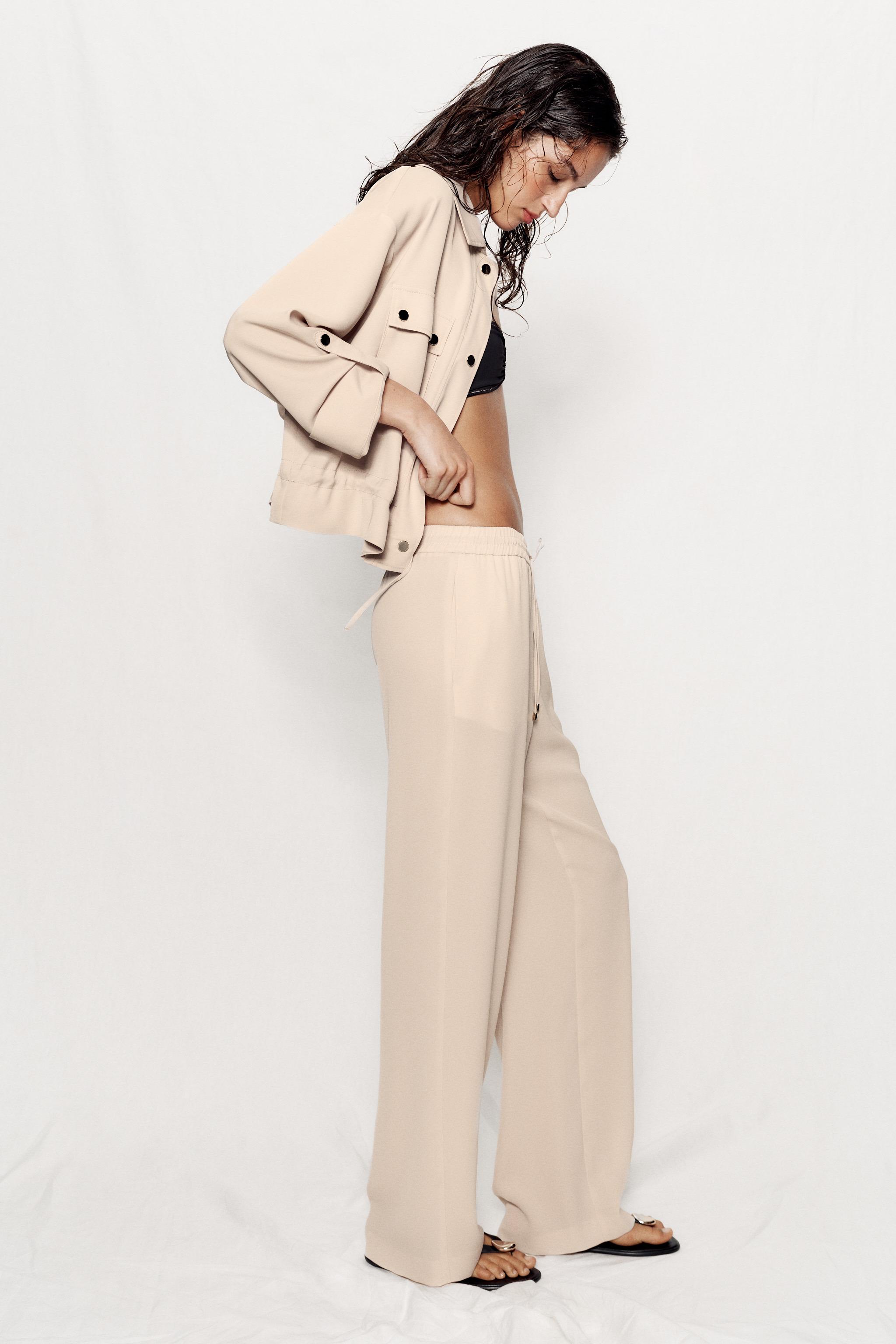 FLOWY ELASTIC WAIST PANTS